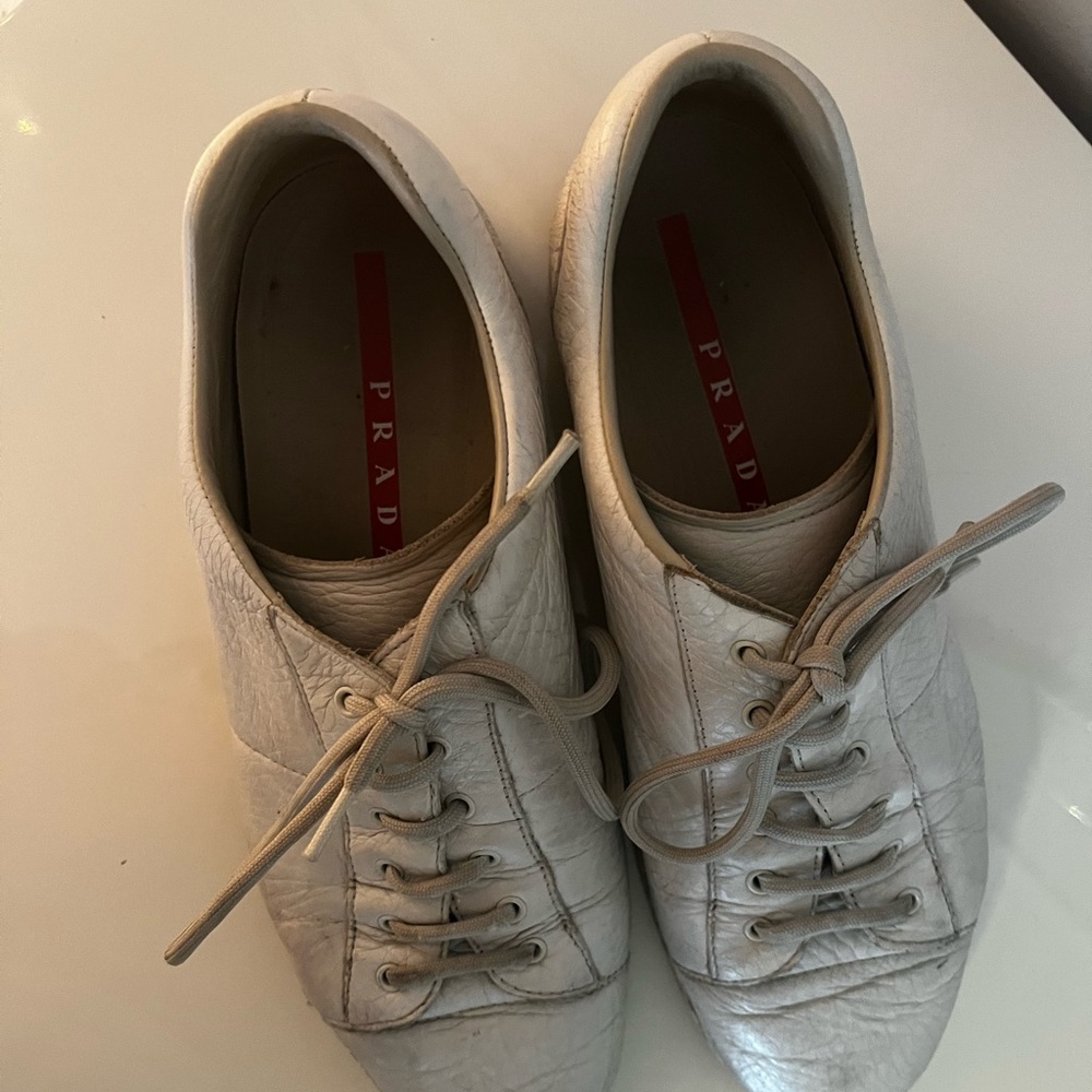 Heavily used prada sneakers